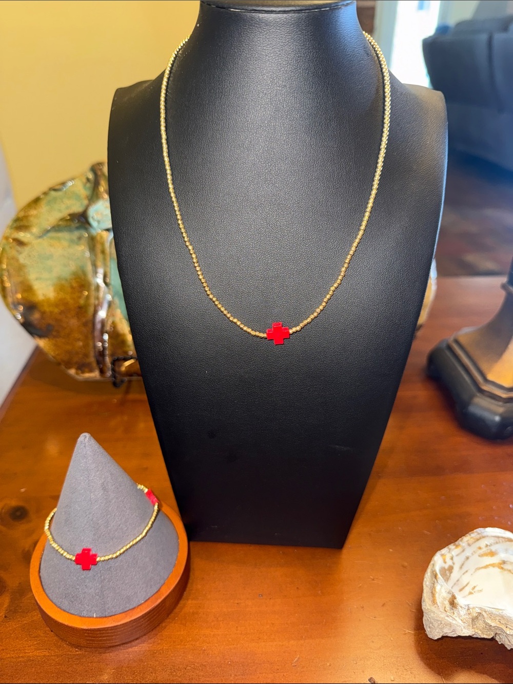 Gold Beaded Necklace with Red Cross Accent